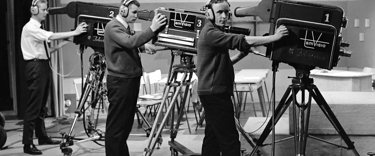 Tamvision’s camera operators Tuomo Kurikka, Lasse Koskinen and Kauno Peltola pose next to television cameras at Frenckell’s studio in Tampere, 1.2.1965 (20181333428)